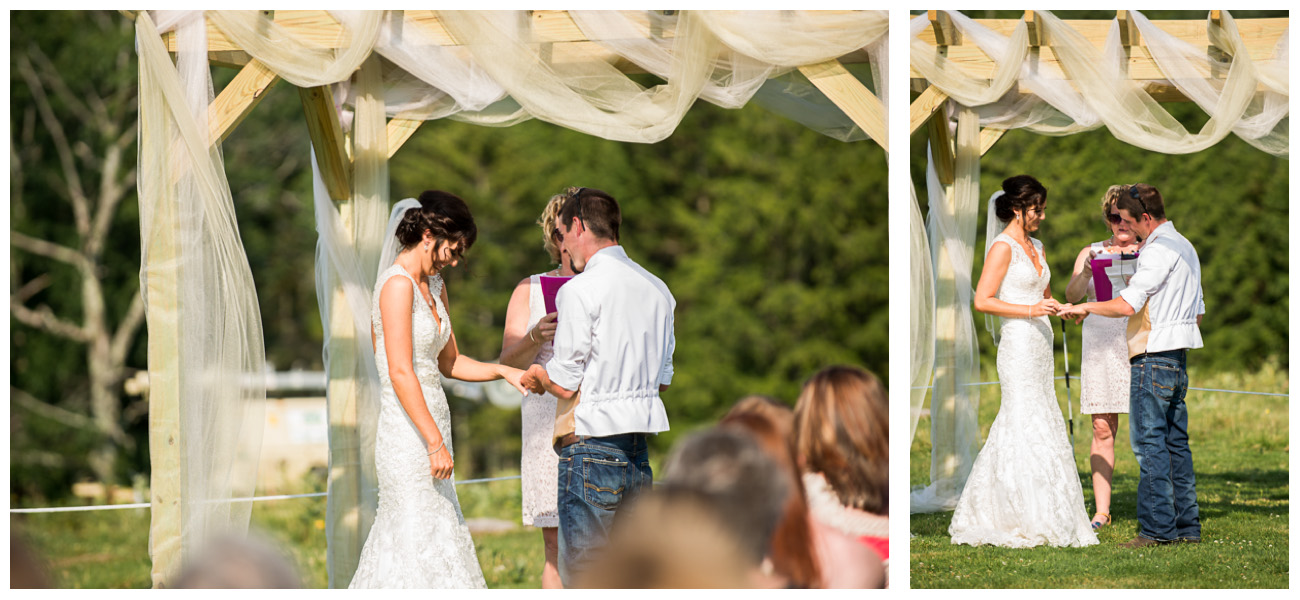 bride and groom exchanging rings at Maine wedding