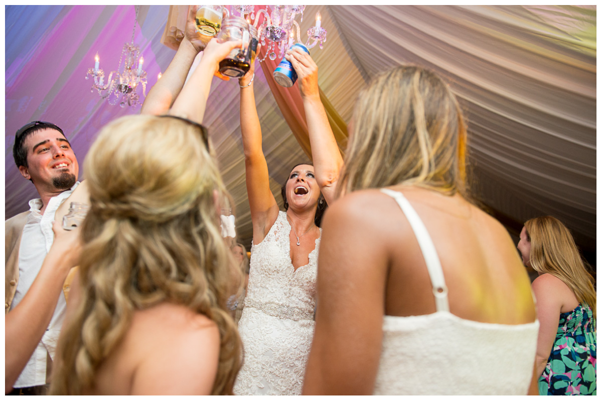 bride celebrating with friends during reception