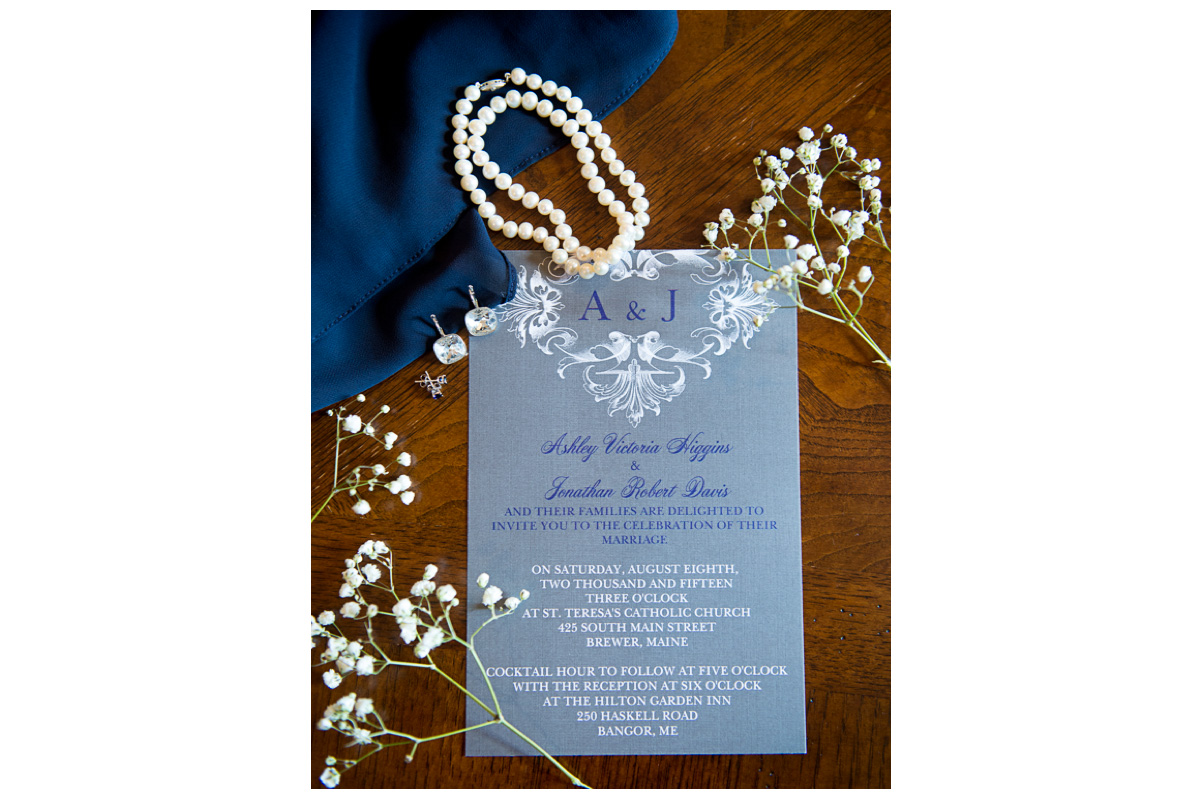 navy blue, white, and grey wedding invitation