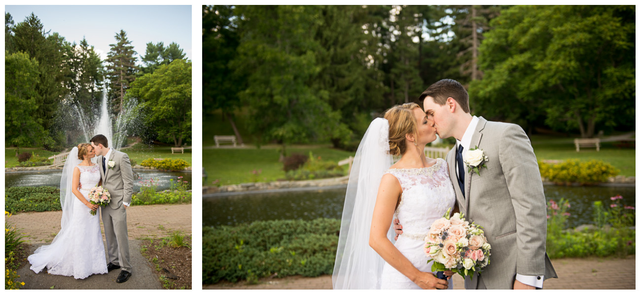 bride and groom kissing in front of foundation at cascade park