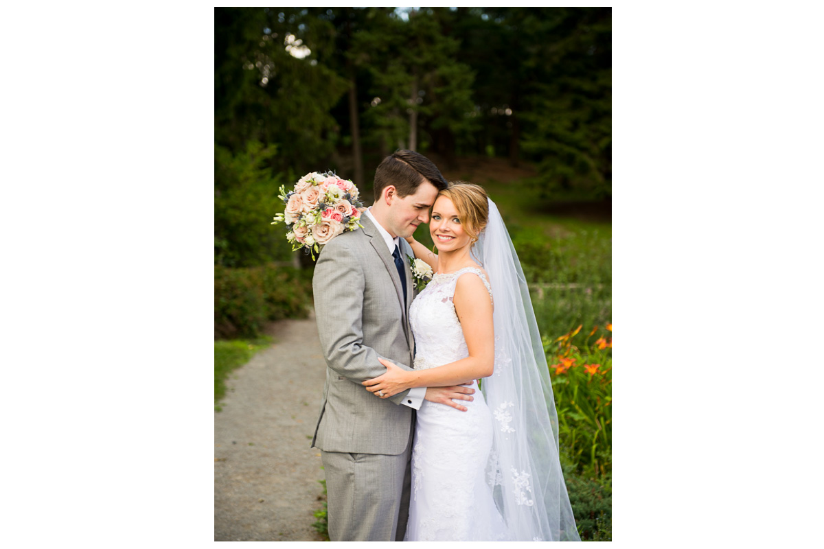 groom looking at bride during photos