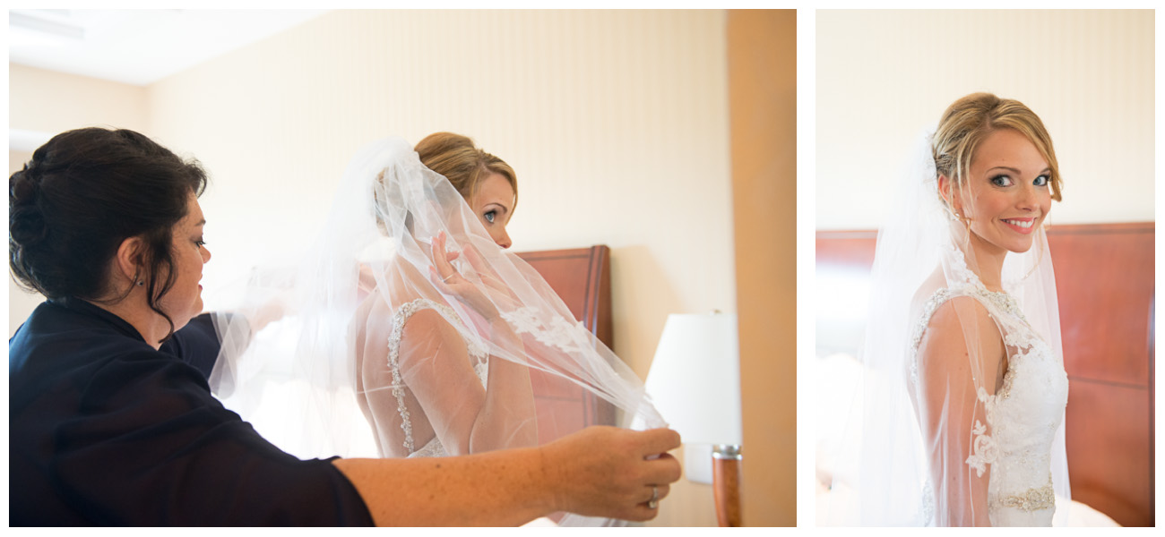 bride getting dressed and putting veil on for wedding