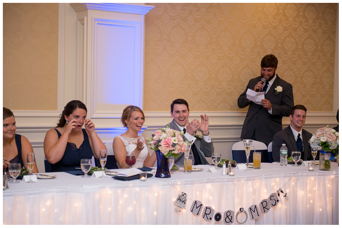 couple laughing during wedding speeches at in Bangor