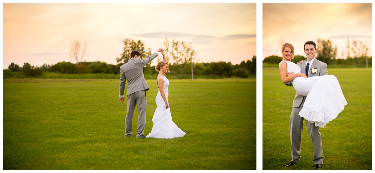bride and groom dancing in field at sunset