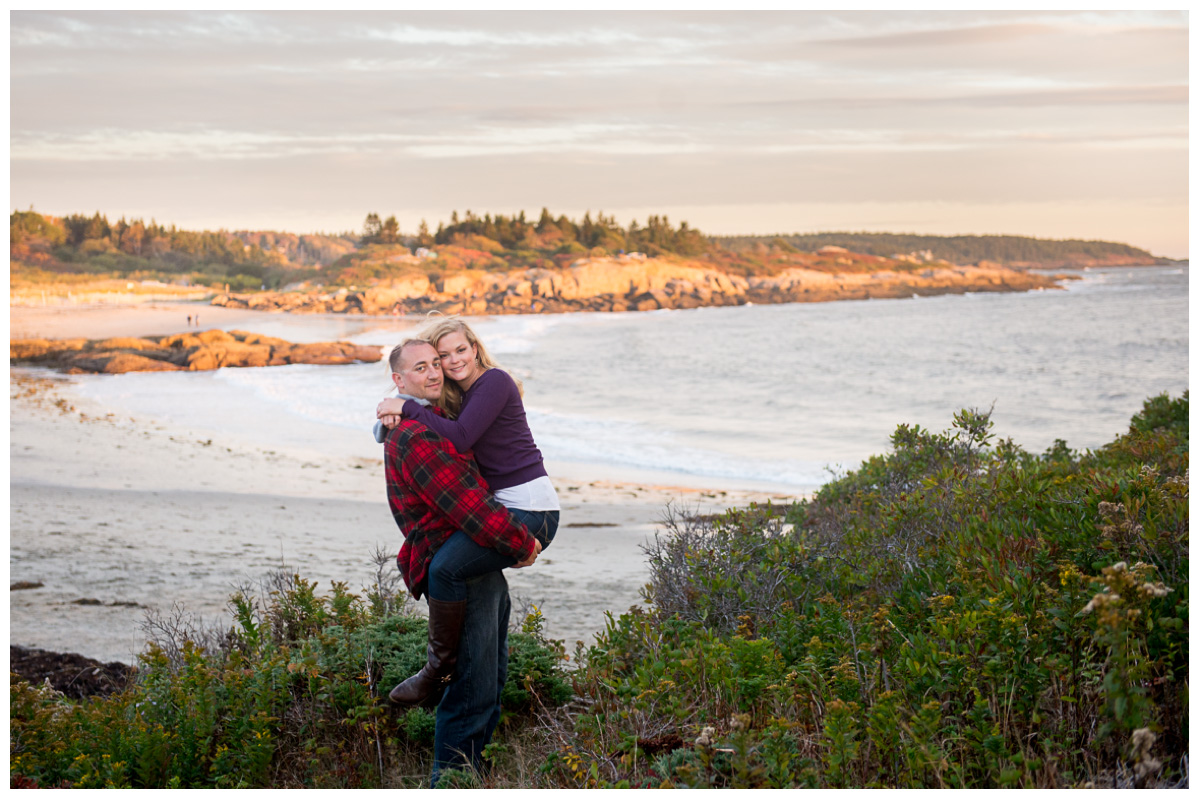 Couple overlooking ocean and maine beach