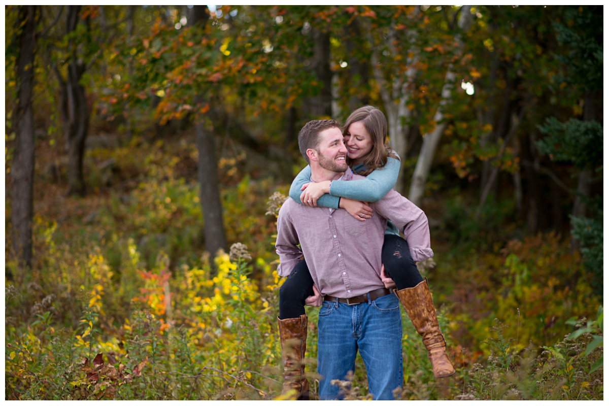 engaged couple looking at each other intimately 