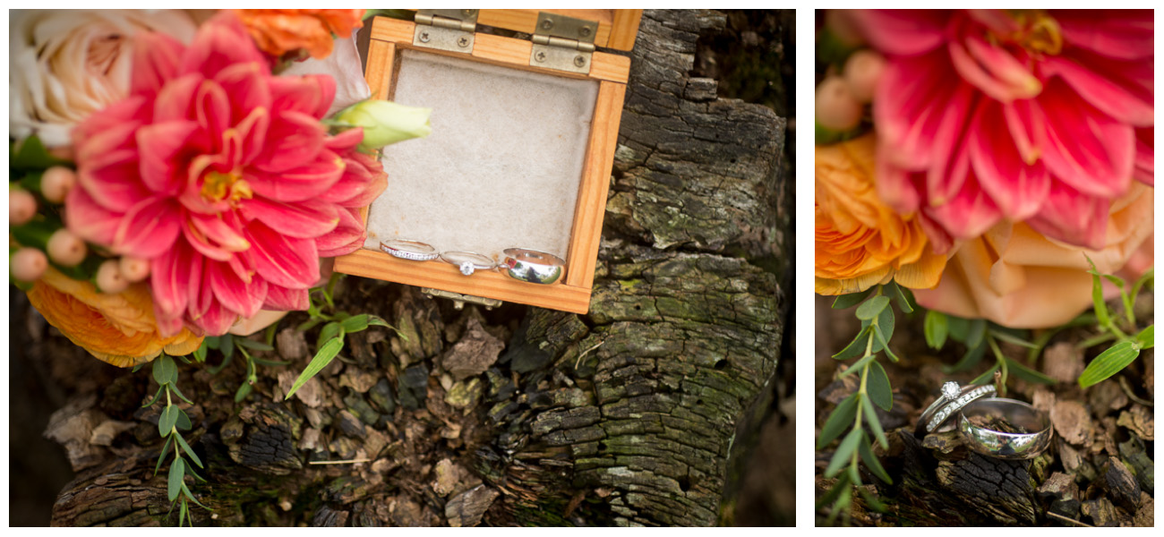 wedding rings in wooden box with coral colors flowers