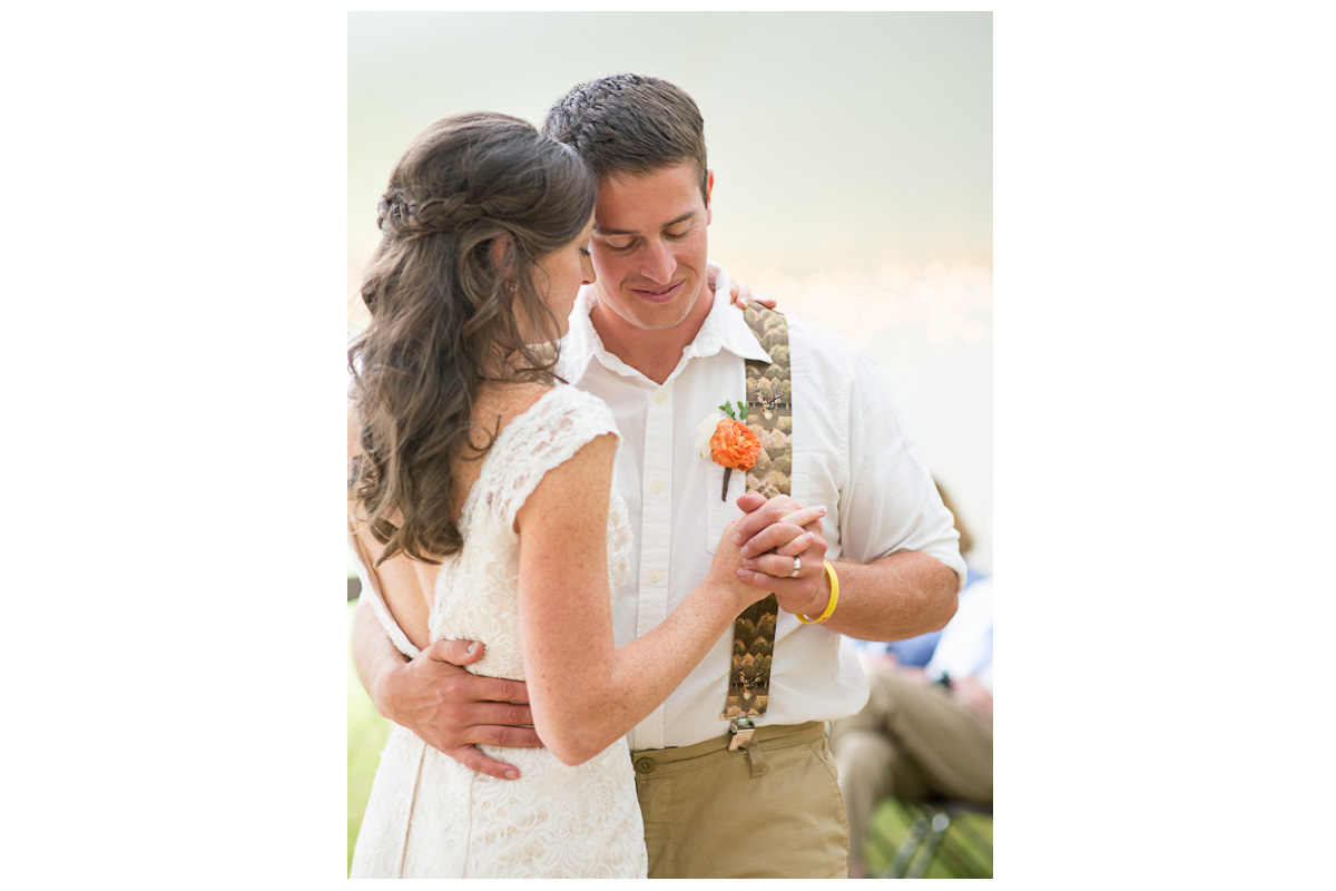 intimate first dance at tented wedding reception