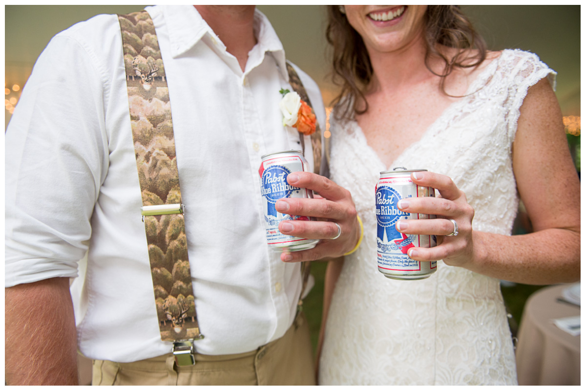 bride and groom with beer at reception
