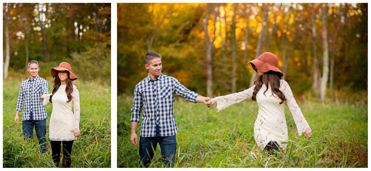 couple walking through field in the fall 