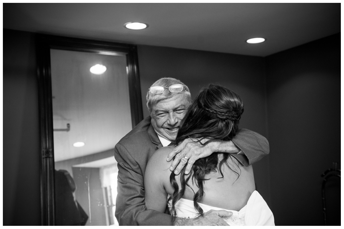 father daughter first look before wedding ceremony