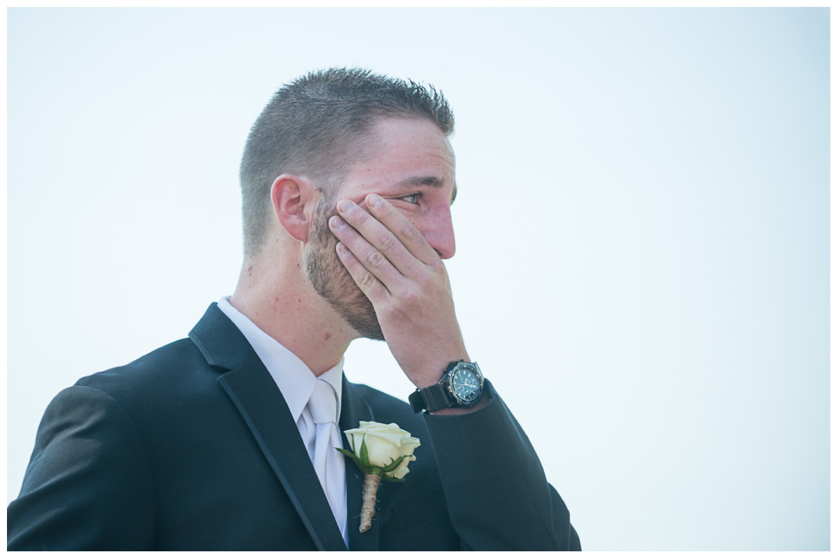 groom crying when he sees bride walk down aisle during a maine wedding