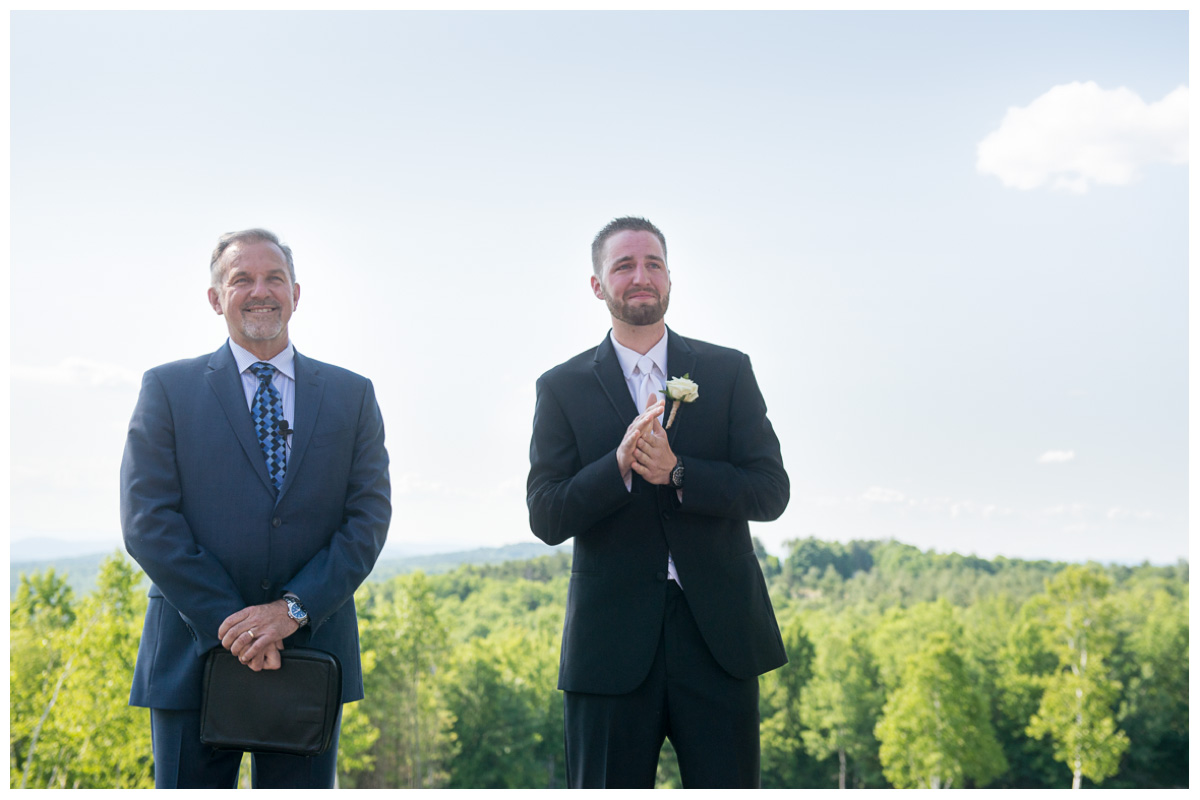 groom's reaction to bride walking down the aisle