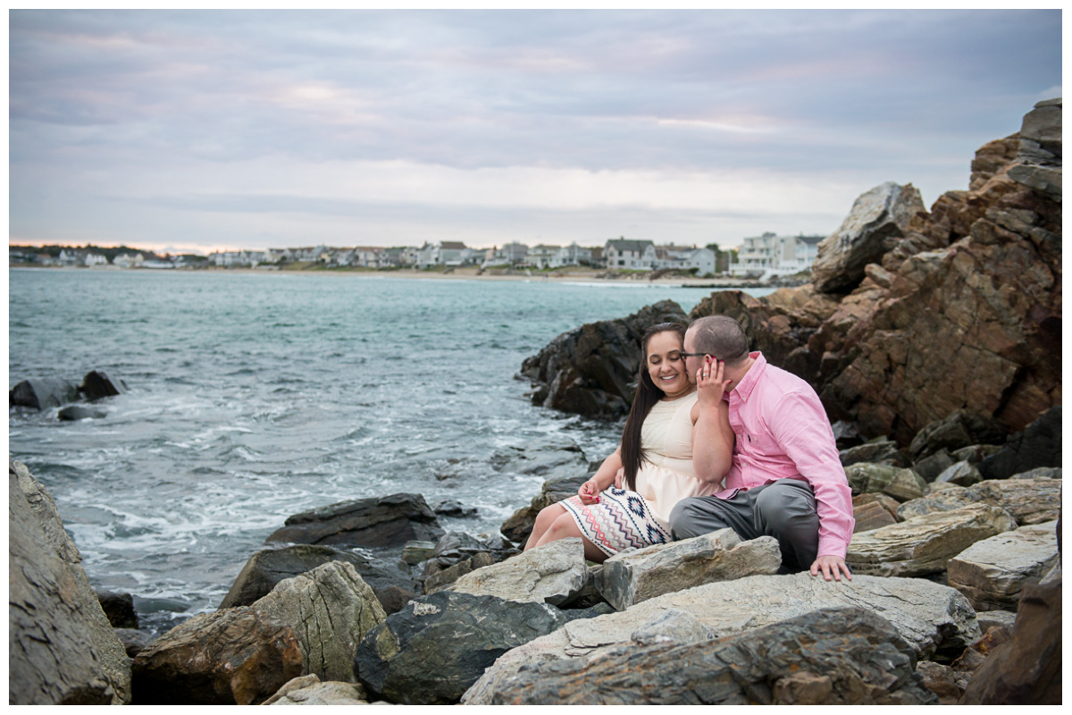 candid engagement photos on beach in New Hampshire
