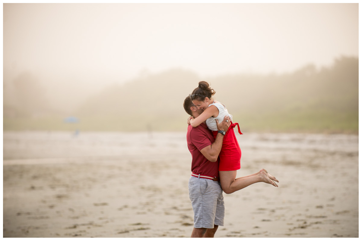 celebrating engagement proposal on the beach