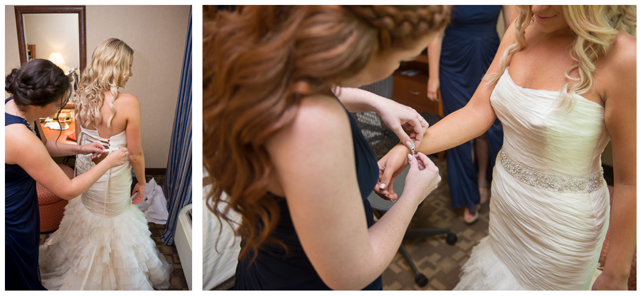 bridesmaids helping bride get ready on wedding day