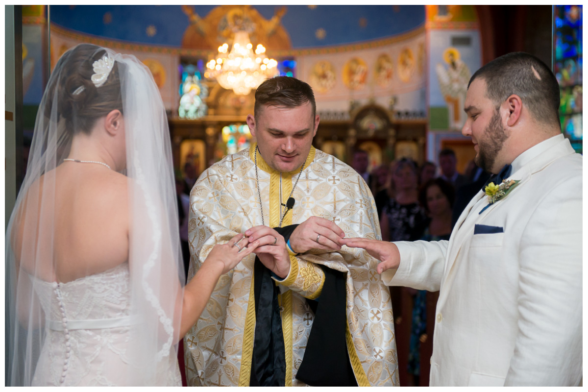 exchanging rings during wedding ceremony