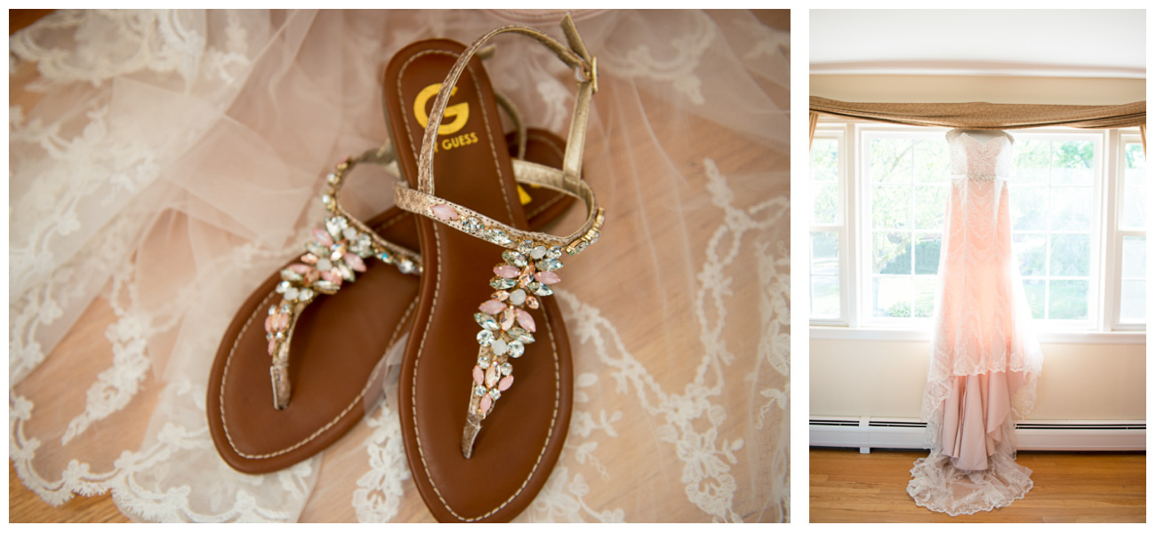 blush weding gown hanging in window 