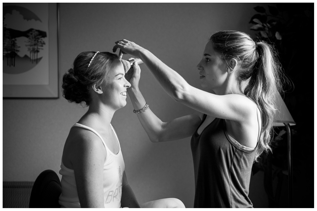 black and white getting ready photo of bride