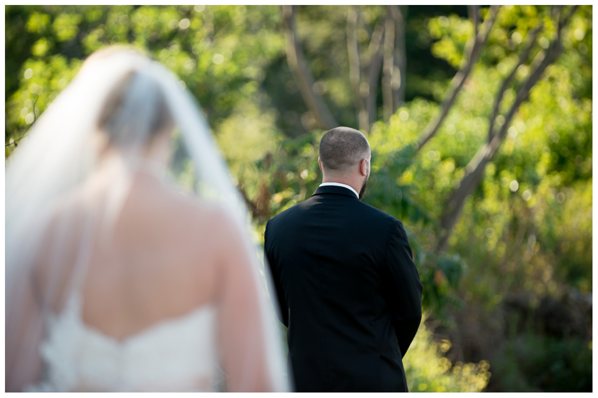 bride walking to first look on the beach 