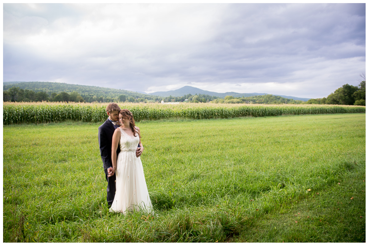 Dreamy wedding photos with stormy sky and fields 