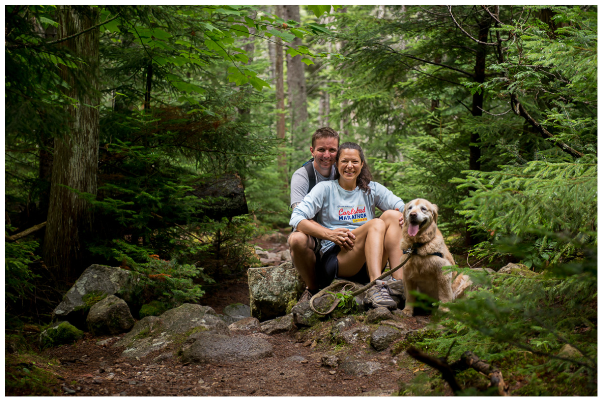 Hiking with dog and engaged couple