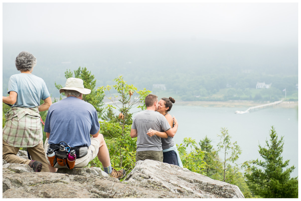 Engagement proposal overlooking ocean in Maine