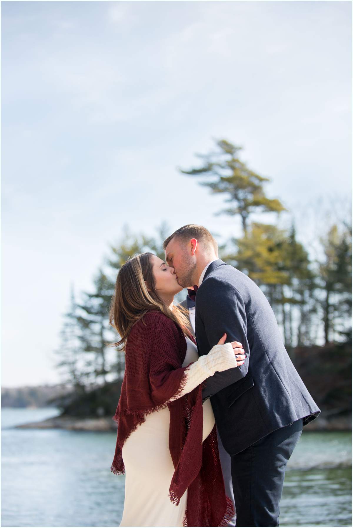 Bride and groom kissing after wedding ceremony in Freeport