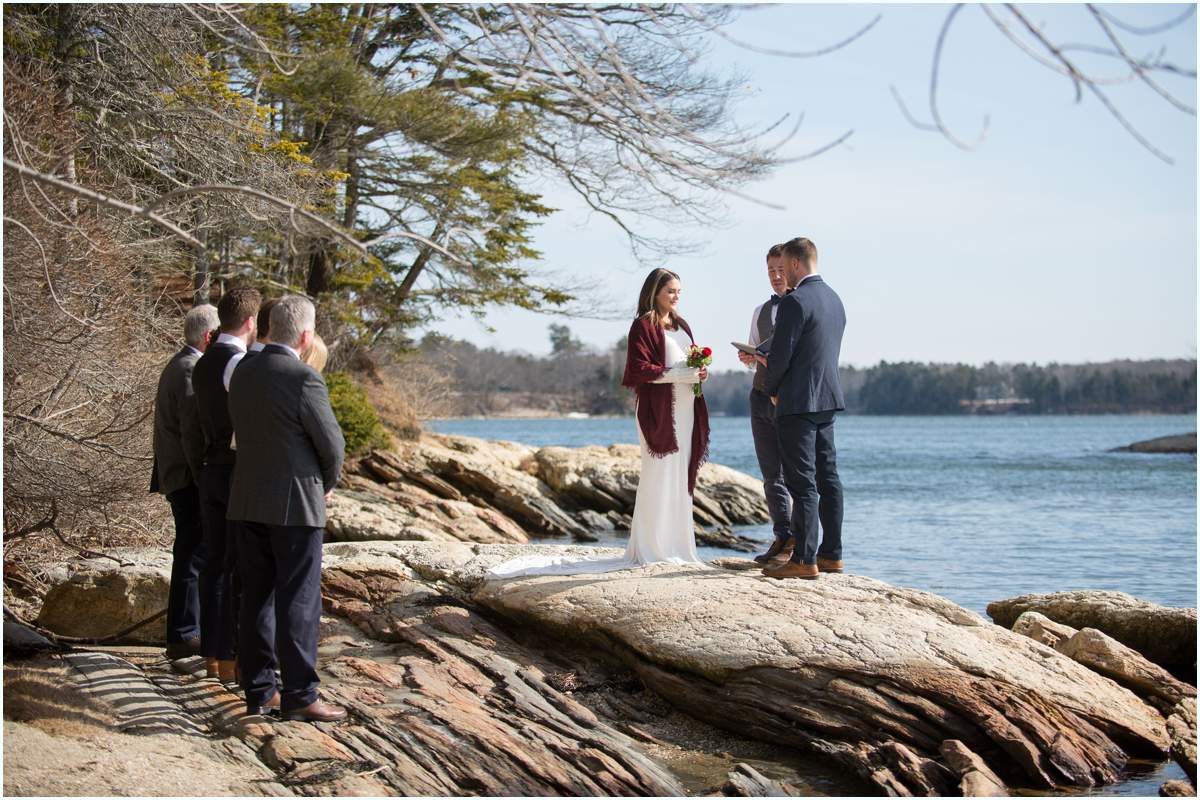 Wedding ceremony on a Maine rocky beach 