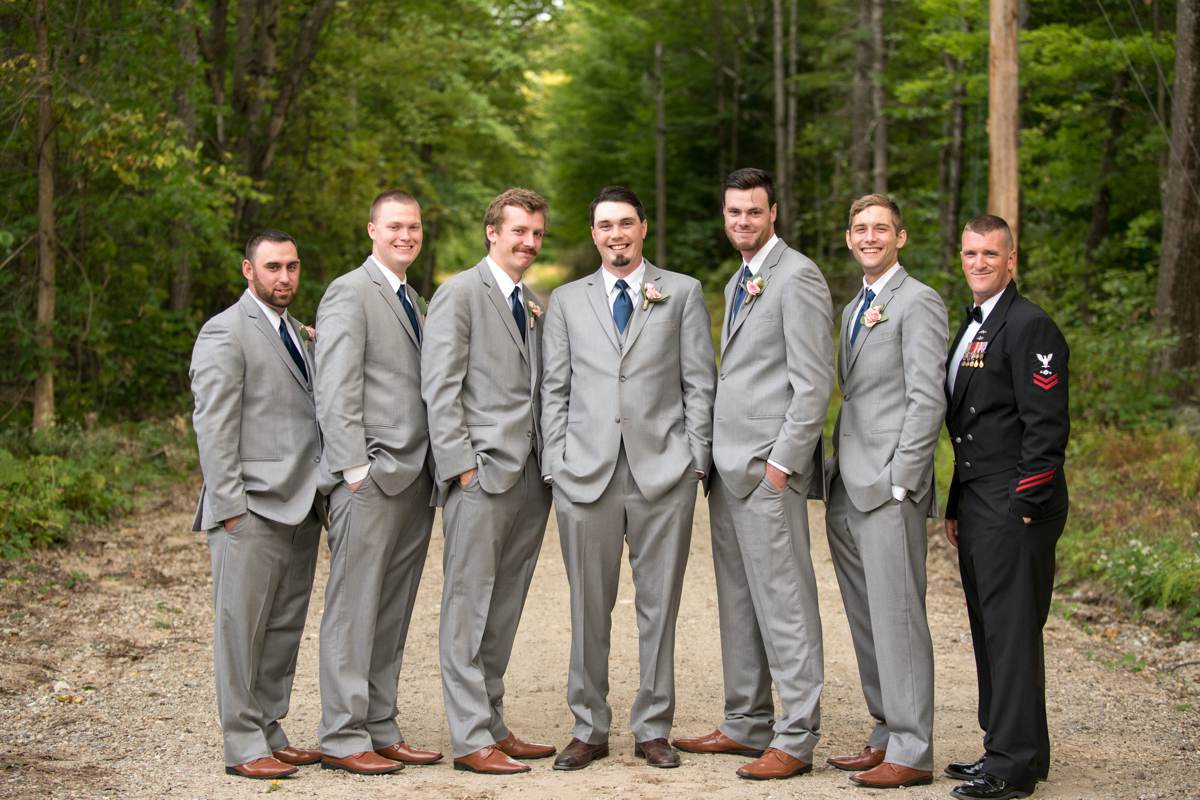 groom with groomsmen on wedding day, grey and navy blue groomsmen suits